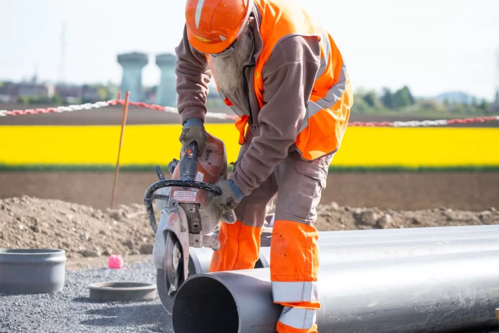 Building construction site with sanitation systems in the 62 region