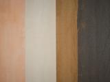 Une palette de matériaux aux teintes minérales et textures contrastées révèle une approche sensible et contemporaine des finitions architecturales.